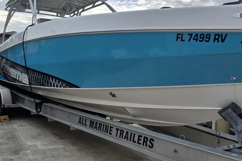  Yacht Photos Pics 2016 Extreme Boats model on trailer, blue and white design, registration FL 7499 RV.