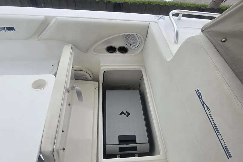  Yacht Photos Pics 2016 Extreme Boats interior with storage compartment and speaker system.