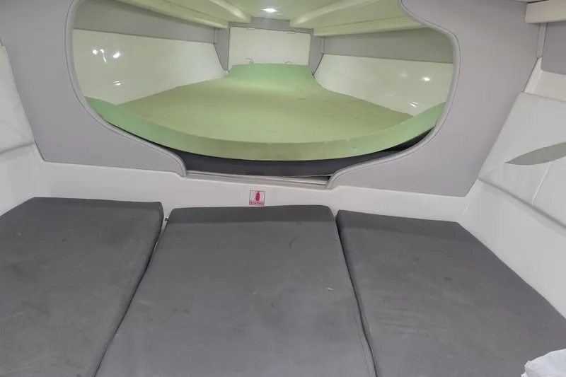  Yacht Photos Pics Interior cabin of a 2016 Extreme Boats model, featuring cushioned seating and modern design.