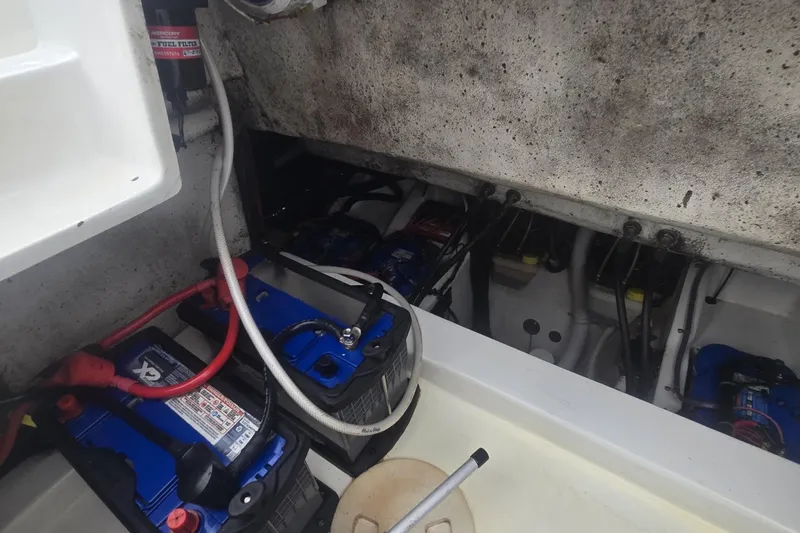  Yacht Photos Pics Engine compartment of a 2016 Extreme Boats model, showing batteries and wiring.