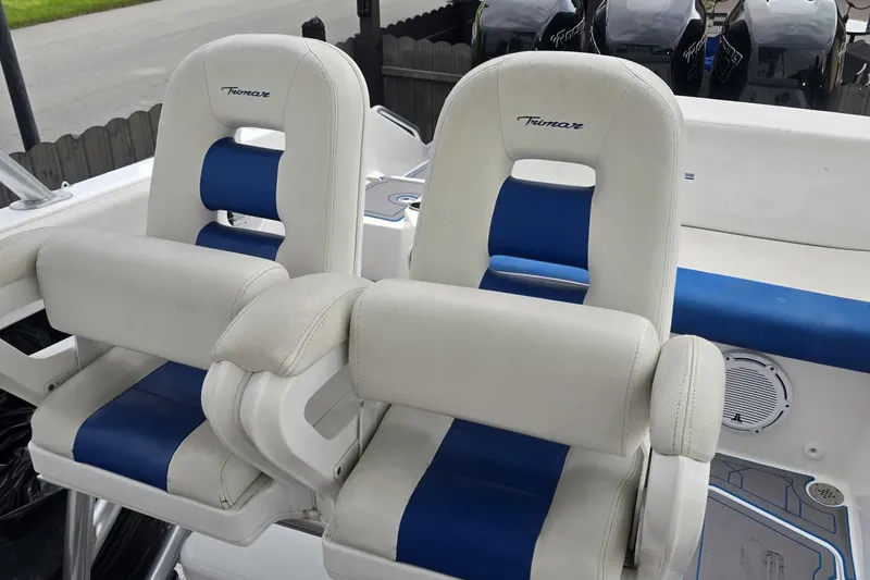  Yacht Photos Pics Twin white and blue boat seats on a 2016 Extreme Boats model.