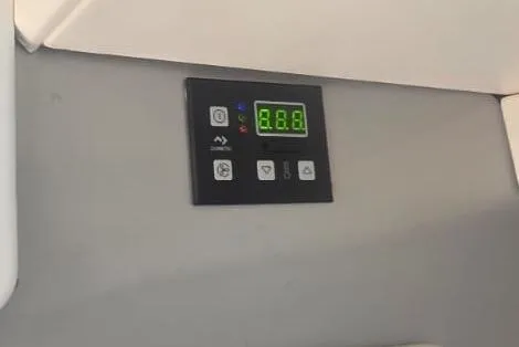  Yacht Photos Pics Control panel on 2016 Extreme Boats model, featuring digital display and buttons.