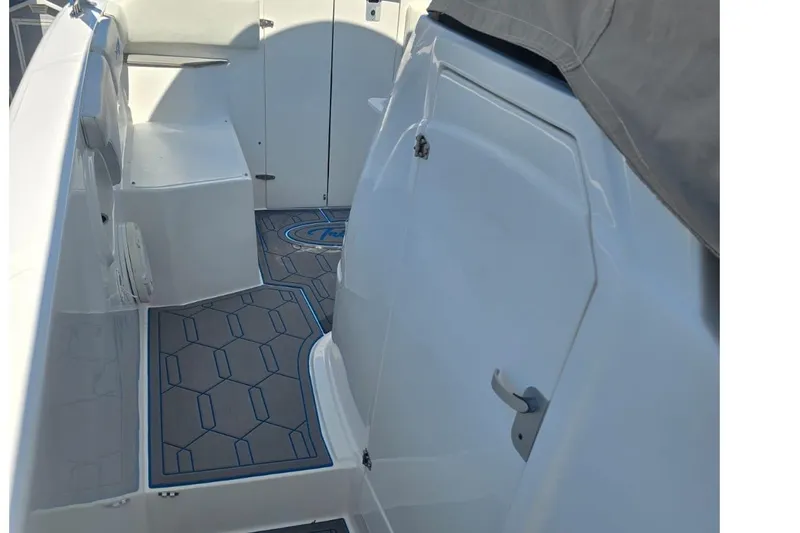  Yacht Photos Pics 2016 Extreme Boats interior with gray flooring and white seating.