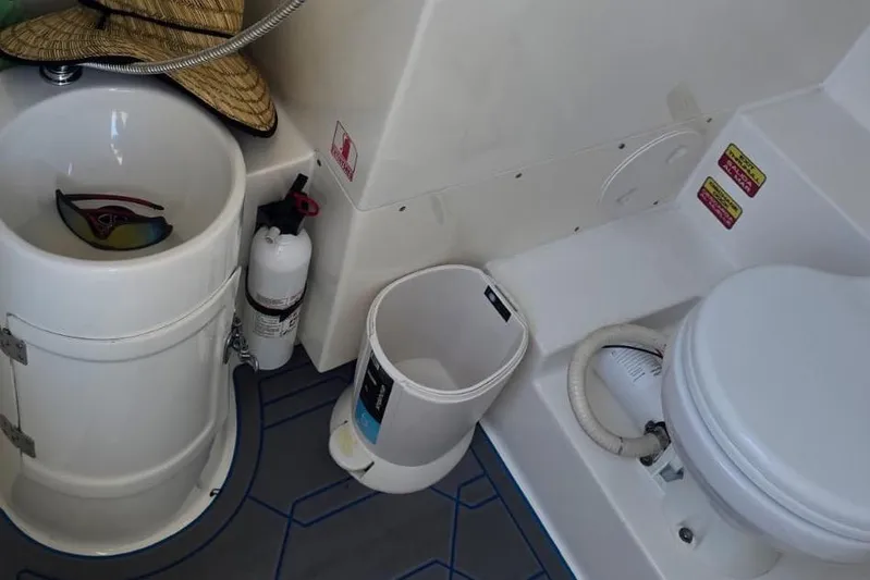  Yacht Photos Pics Interior of a 2016 Extreme Boats model featuring a compact bathroom setup.