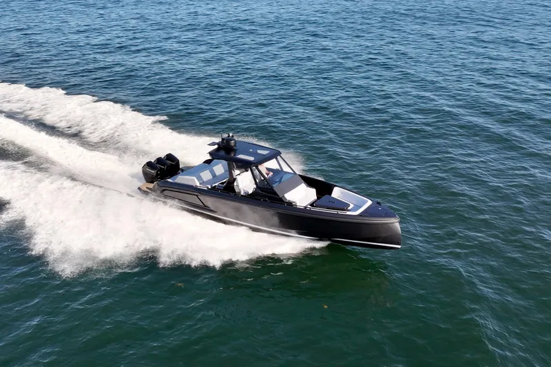 Liberty Yacht Photos Pics 2024 Vanquish Yachts VQ40 cruising swiftly on open water.