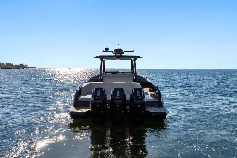 Liberty Yacht Photos Pics 2024 Vanquish Yachts VQ40 on open water, showcasing powerful engines and sleek design.