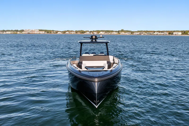 Liberty Yacht Photos Pics 2024 Vanquish Yachts VQ40 luxury yacht on open water, clear sky background.