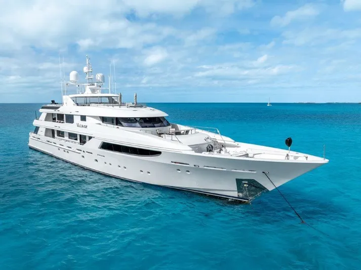 Valinor Yacht Photos Pics Luxurious 2013 Westport W164 yacht on clear blue ocean waters.