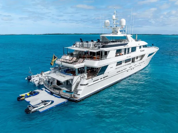 Valinor Yacht Photos Pics Luxurious 2013 Westport W164 yacht on clear blue ocean waters.