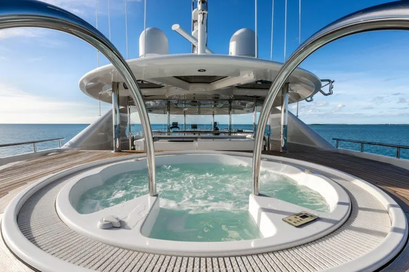 Valinor Yacht Photos Pics Luxurious 2013 Westport W164 yacht with a jacuzzi on deck, ocean view.