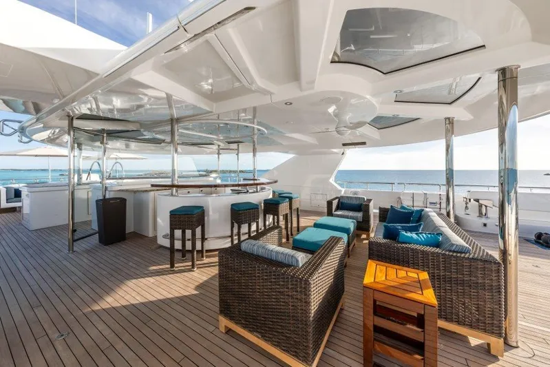 Valinor Yacht Photos Pics Luxurious 2013 Westport W164 yacht deck with seating and ocean view.