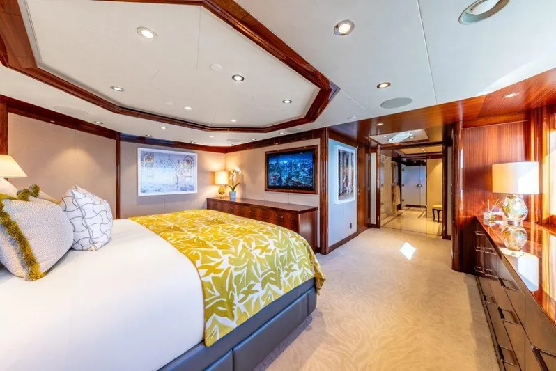 Valinor Yacht Photos Pics Luxurious bedroom interior on 2013 Westport W164 yacht, featuring elegant decor and modern amenities.