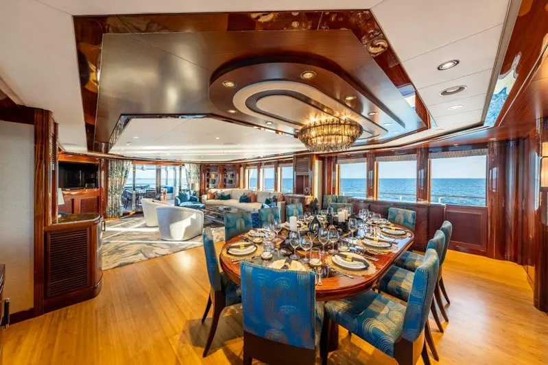 Valinor Yacht Photos Pics Luxurious 2013 Westport W164 yacht interior with elegant dining area and ocean view.