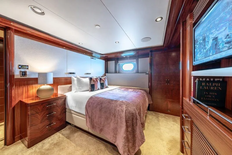 Valinor Yacht Photos Pics Luxurious bedroom interior on 2013 Westport W164 yacht with elegant wood finishes.