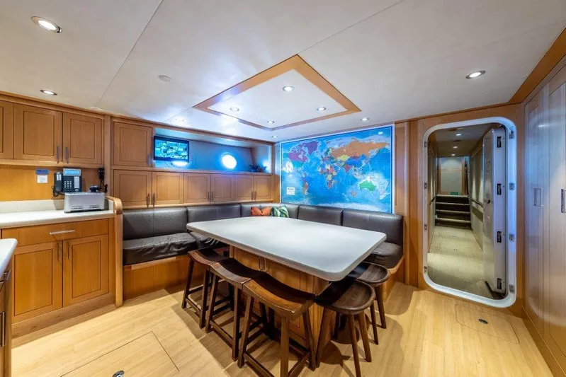 Valinor Yacht Photos Pics Luxurious yacht interior with dining area, world map, and modern amenities, Westport W164, 2013.