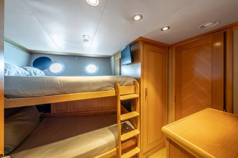 Valinor Yacht Photos Pics Cozy 2013 Westport W164 yacht cabin with bunk beds and wooden furnishings.
