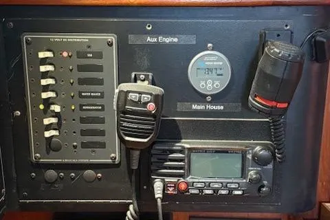 Windragon Yacht Photos Pics Control panel of a 1995 Island Packet 37 sailboat with communication equipment.