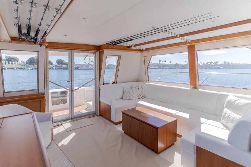  Yacht Photos Pics Luxurious interior of 2006 West Bay 64 yacht with panoramic water views.