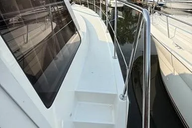  Yacht Photos Pics 2007 Island Pilot 395 yacht deck with sleek design and stainless steel railings.