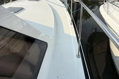  Yacht Photos Pics 2007 Island Pilot 395 yacht deck with railing and window.