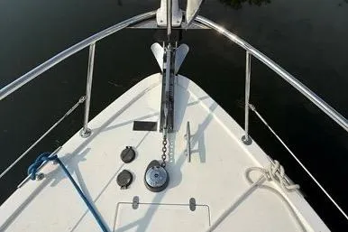  Yacht Photos Pics Bow view of 2007 Island Pilot 395 boat with anchor and railing.
