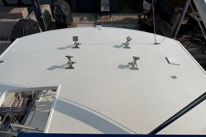  Yacht Photos Pics 2007 Island Pilot 395 boat deck with mounted solar panels and railing.