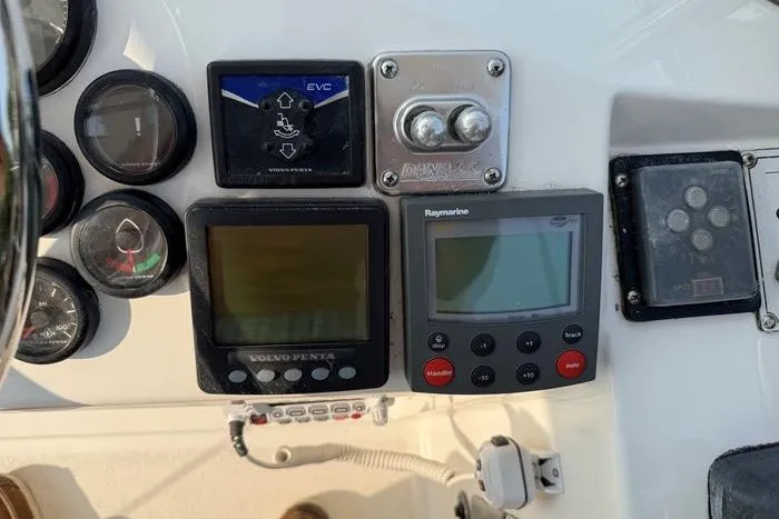  Yacht Photos Pics Control panel of a 2007 Island Pilot 395 with various navigation instruments.