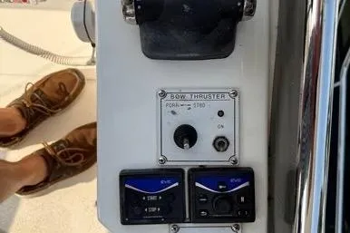  Yacht Photos Pics Control panel of a 2007 Island Pilot 395 boat, featuring bow thruster controls.