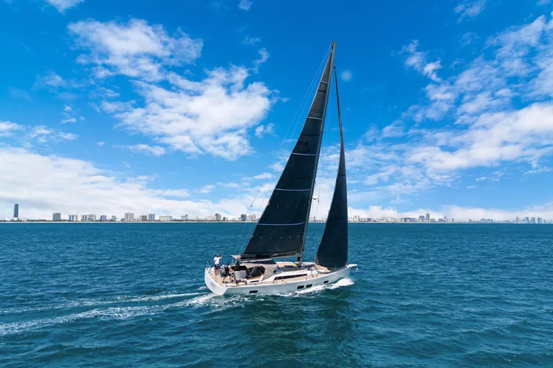 Estela Yacht Photos Pics Sailing yacht Grand Soleil 52 Long Cruise, 2017, on open sea under clear blue sky.