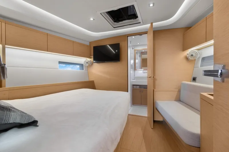 Estela Yacht Photos Pics Luxurious interior of 2017 Grand Soleil 52 Long Cruise yacht cabin with modern amenities.