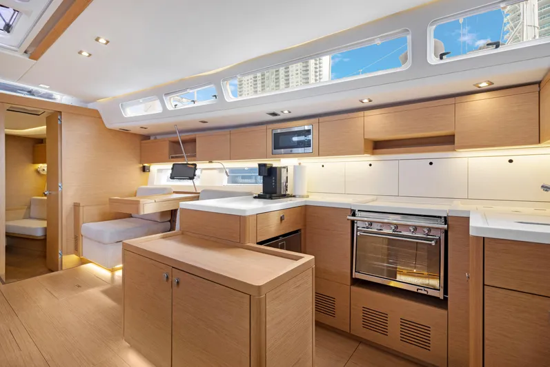 Estela Yacht Photos Pics Luxurious interior of 2017 Grand Soleil 52 Long Cruise yacht with modern kitchen design.