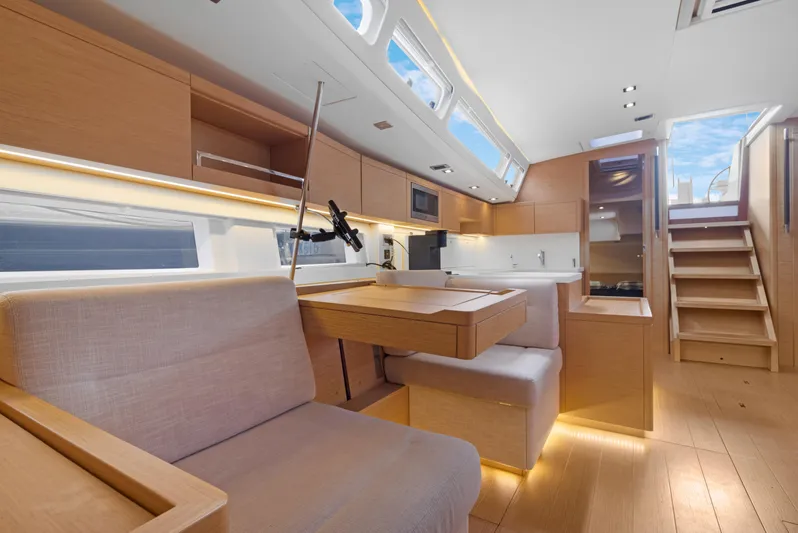 Estela Yacht Photos Pics Luxurious interior of 2017 Grand Soleil 52 Long Cruise yacht with modern design and ample lighting.
