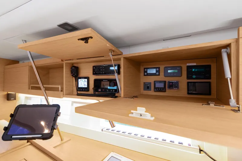Estela Yacht Photos Pics Control panel and navigation equipment inside a 2017 Grand Soleil 52 Long Cruise yacht.