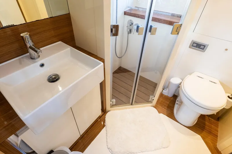 Balliamo Yacht Photos Pics Luxurious bathroom in 2011 Uniesse 55S yacht with modern fixtures and shower.