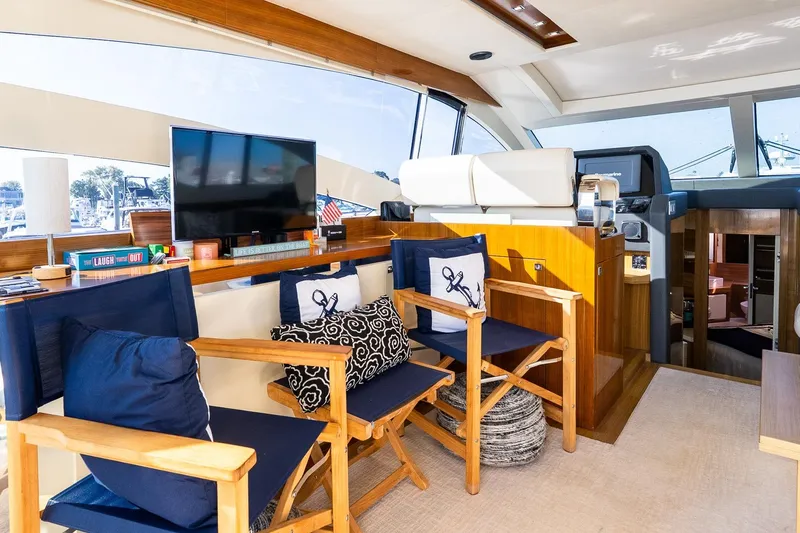 Balliamo Yacht Photos Pics Luxurious interior of 2011 Uniesse 55S yacht with elegant seating and modern decor.