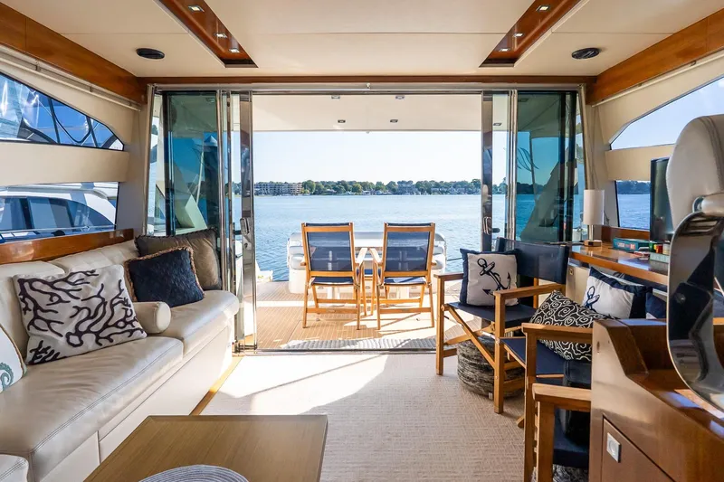 Balliamo Yacht Photos Pics Luxurious interior of 2011 Uniesse 55S yacht with lake view and elegant seating.