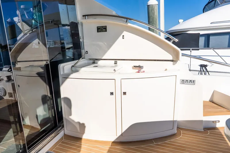 Balliamo Yacht Photos Pics Luxury yacht Uniesse 55S 2011, featuring sleek outdoor cabinetry and modern design elements.
