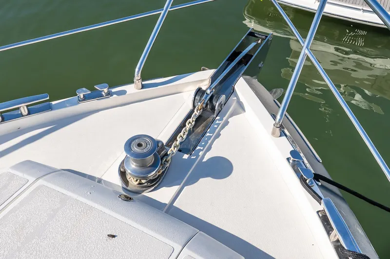 Balliamo Yacht Photos Pics Bow of 2011 Uniesse 55S yacht with anchor chain and winch system.
