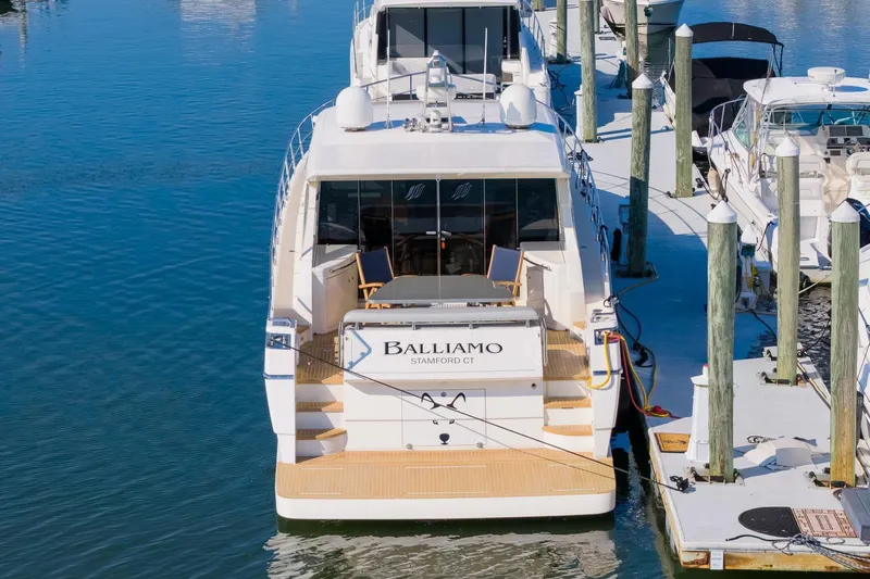 Balliamo Yacht Photos Pics 2011 Uniesse 55S yacht docked at marina, rear view.