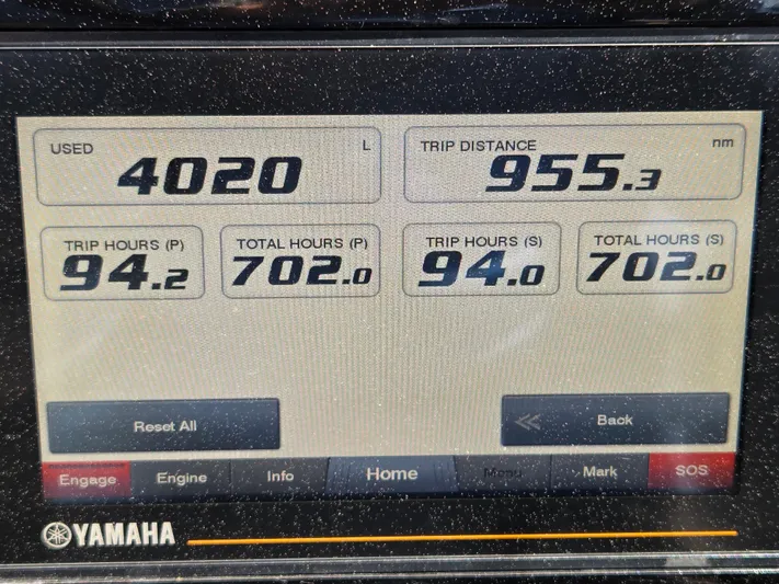 First Mate Yacht Photos Pics Yamaha display showing trip data: 4020L used, 955.3 nm distance, 702 total hours.