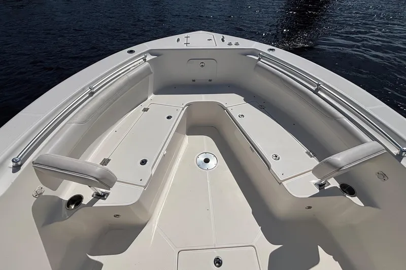 Tagged Yacht Photos Pics 2023 Sea Born LX26 Center Console boat interior with spacious seating and storage.