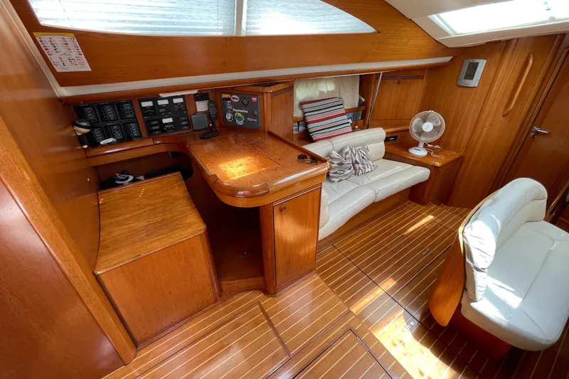 4 Estrellas Yacht Photos Pics Interior of 2006 Jeanneau Sun Odyssey 49 DS with wooden finish.