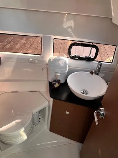  Yacht Photos Pics 2020 Jeanneau NC 895 bathroom with modern sink and toilet.