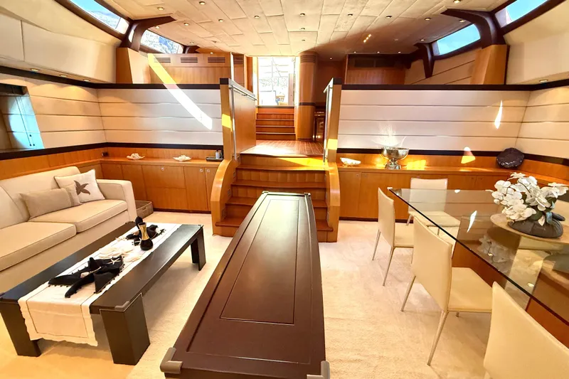  Yacht Photos Pics Luxurious interior of 2004 Dereli S/Y 39 m yacht with elegant dining and seating area.