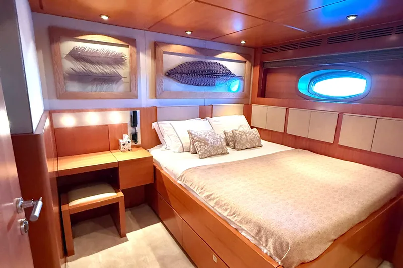  Yacht Photos Pics Luxurious cabin interior of 2004 Dereli S/Y 39 m yacht with elegant wood finish.