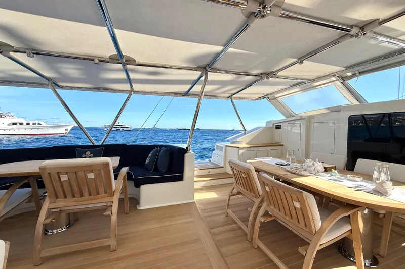  Yacht Photos Pics Luxurious Dereli S/Y 39 m yacht deck with elegant seating, ocean view, and dining setup.