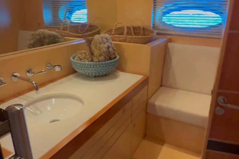  Yacht Photos Pics Luxurious yacht bathroom with sink, seating, and decorative elements on Dereli S/Y 39 m, 2004.