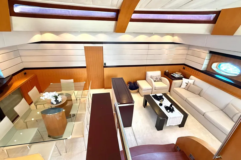  Yacht Photos Pics Luxurious interior of 2004 Dereli S/Y 39 m yacht with modern dining and seating area.