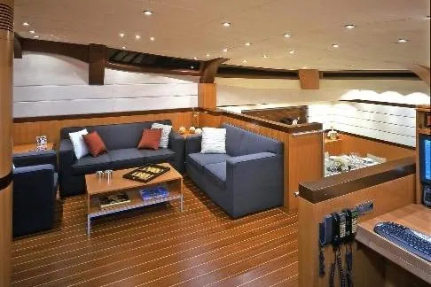  Yacht Photos Pics Luxurious interior of 2004 Dereli Yachts S/Y 42 m, featuring elegant seating and wooden flooring.