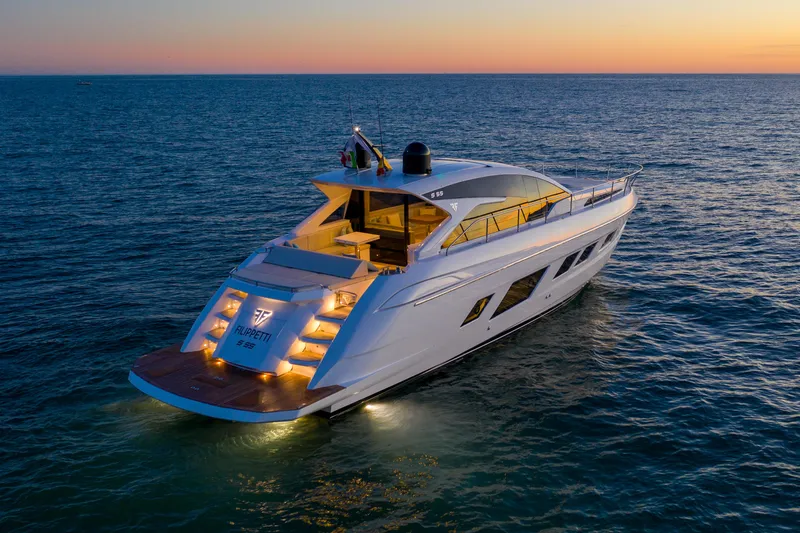 Filippetti S55 Yacht Photos Pics 2025 Filippetti Sport 55 yacht cruising at sunset on open sea.